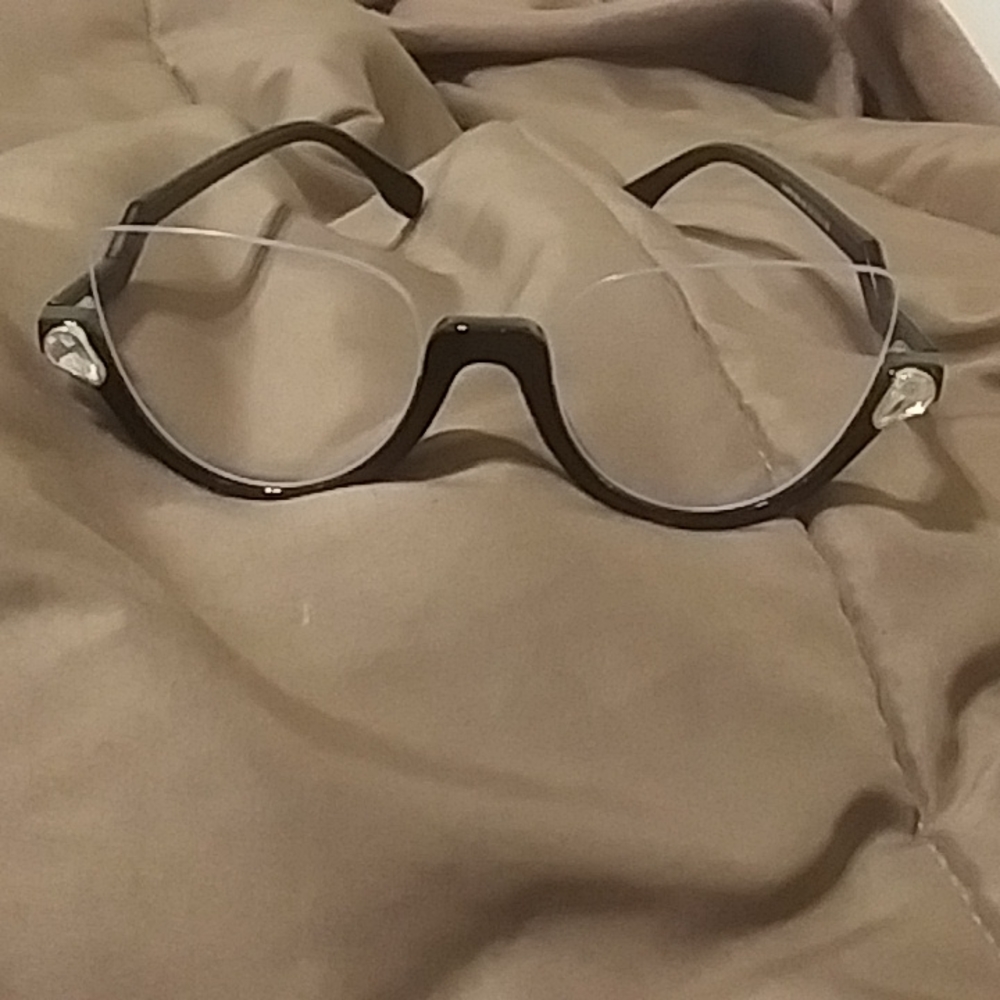 Black cat eye reamless clear glasses